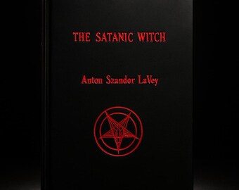 May include: A black book titled "THE SATANIC WITCH" by Anton Szandor LaVey. The title and author's name are in red, along with a red pentagram symbol. The book is set against a dark background.