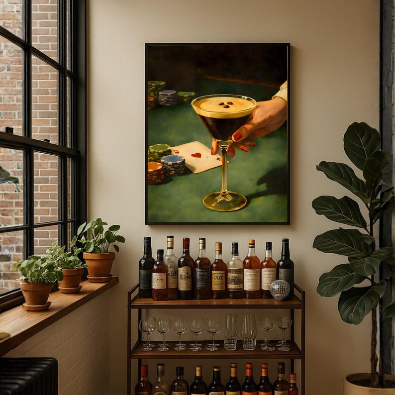 Vertical martini print featuring an espresso martini cocktail wall art, displayed above a brass bar cart with shaker and glass accessories, perfect for a sophisticated moody bar decor and home bar styling.