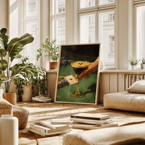 Vertical espresso martini printable wall art styled in a bright, sunlit living room with indoor plants, featuring the poker night gambling decor as a chic digital download for modern apartment decor and coffee cocktail art lovers.