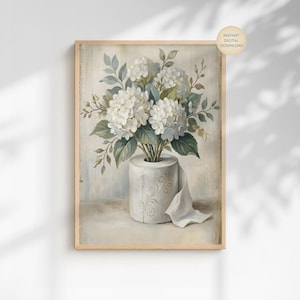 May include: A set of three ceramic mugs with a speckled, matte finish. The mugs are in shades of cream, light gray, and dark gray. Each mug has a simple, minimalist design and a rounded handle. Perfect for coffee or tea.