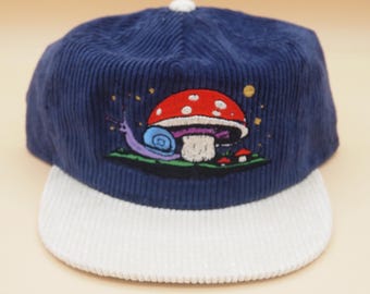 The Fellowship of the Snails: Embroidered Navy/Creme Corduroy Hat Snail and mushroom design