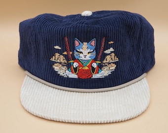 The Samurai Cat. Embroidered dark blue corduroy rope hat.
