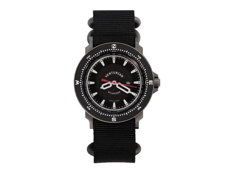 May include: Black Venturian Wildsider watch with a black nylon strap. The watch face is black with white markings, a red second hand, and the date. The watch has a compass-style bezel. The watch is designed for outdoor use.