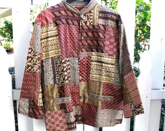 May include: A red, gold, and brown patchwork jacket with a mandarin collar and button closure.