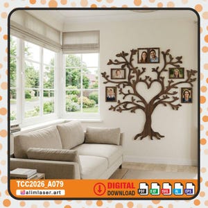 May include: A dark brown wooden wall decal shaped like a tree with a heart-shaped cutout in the center. The tree features five rectangular photo frames attached to its branches, each displaying a portrait of a person. The text TCC2026_A079 is visible.
