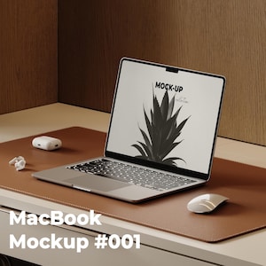 May include: A silver MacBook laptop with a black screen displaying a black and white plant graphic. The laptop sits on a brown leather desk mat, with a white mouse and wireless earbuds nearby. The text "MacBook Mockup #001" is at the bottom.
