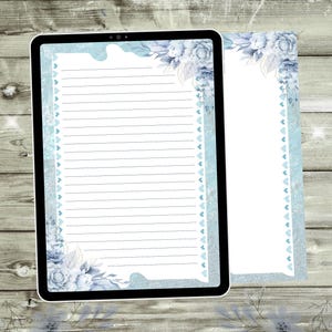 May include: A digital tablet and a notepad with a blue and white floral design. The tablet shows lined paper with a light blue border and floral accents. The notepad has a similar design, with a wooden background.