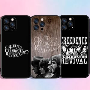 May include: Three black phone cases featuring the band Creedence Clearwater Revival. One case has the band's logo, another has a wood grain background with the band's name, and the third has a photo of the band members.