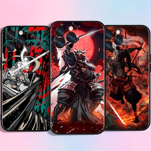 May include: Three phone cases with striking samurai warrior designs. The cases feature detailed illustrations in red, black, and white, with a dramatic red moon backdrop. Each case showcases a different samurai pose with swords.