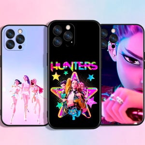 May include: Three phone cases with distinct designs. One case showcases a group of animated characters, another features the word "Hunters" with a star graphic, and the third displays a close-up of an animated character's face.