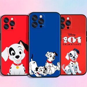 May include: Three phone cases featuring Dalmatian designs. The cases are red and blue, with images of the Disney movie "101 Dalmatians." The cases have a black border and feature the cartoon dogs in various poses.