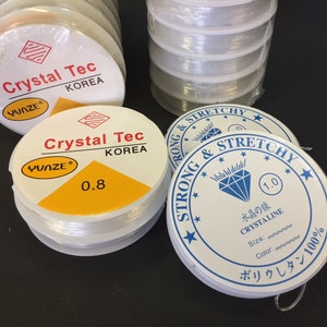 卸売 0.5 mm、0.8 mm、または 1 mm クリスタルクリア 強力で長持ち 伸縮性のある透明コード ブレスレットビーズコードに最適 (G2939)