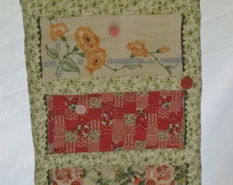 Handmade Hanging Organizer, Made From Vintage Hanger, Fabric, Buttons, Quilt Pieces and Linens, 7 Pockets, 23''x14 3/4''