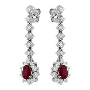 May include: A pair of elegant drop earrings. Each earring features a teardrop-shaped, deep red gemstone surrounded by a halo of small, sparkling diamonds. A line of diamonds connects to the ear post.