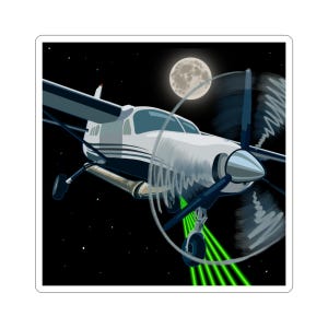 May include: A sticker featuring a white and blue airplane with a spinning propeller, set against a black night sky with a full moon. Green laser beams emanate from the plane, creating a dynamic and futuristic scene.