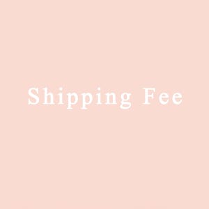 May include: A pale peach background with the words "Shipping Fee" in white, centrally positioned. The text is in a serif font.