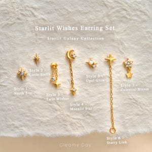 Peut inclure: Ensemble de boucles d'oreilles Starlit Wishes de la collection Starlit Galaxy comprenant sept styles dorés : North Star, Little Stella, Twin Wishes, Moonlit Star, Opal Glow, Starry Link et Celestial Bloom avec pierres claires et opale.