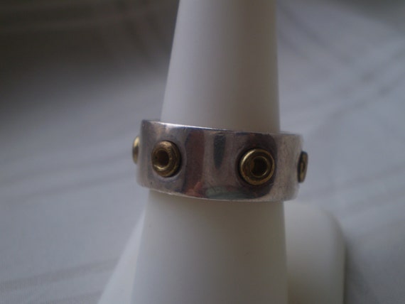 Brand Silver Band  Ring Gold Colored Grommets - image 1