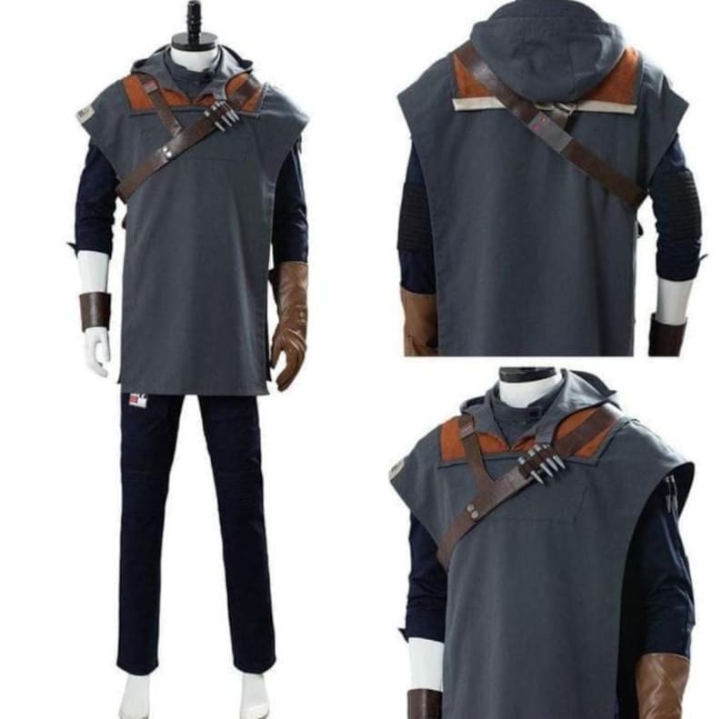May include: A gray hooded tunic with brown leather accents and straps, paired with navy pants and gloves. The costume features a dark blue long-sleeve shirt underneath. The outfit is displayed on a mannequin.