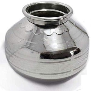 May include: A polished silver metal pot with a rounded base and a narrow, circular rim. The pot features etched horizontal lines and decorative patterns. The pot is displayed on a white surface.