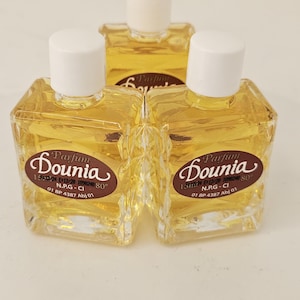 Dounia Perfume | Attraction, Love, Wealth & Spiritual Blessings | African Traditional Cologne Oil (1–3 Bottles)