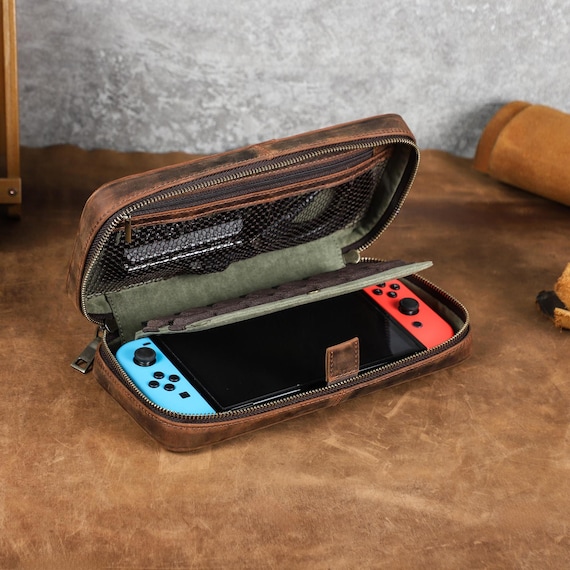 Genuinely handcrafted leather travel organizer for Nintendo Switch — the kind of premium, artisan alternative to mass-produced plastic cases that a real leatherworker made.
