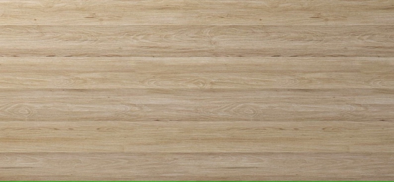 May include: A close-up of a light brown wood grain surface. The wood has a natural, warm tone and a smooth texture.