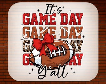 May include: A digital DTF transfer design with a football and a red bow. The words "It's Game Day y'all" are in the design. The words "READY TO PRESS" and "DTF TRANSFER" are also in the design.