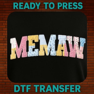 May include: Black DTF transfer with the word "MEMAW" in patchwork letters. The letters are decorated with floral, gingham, and solid patterns in pink, yellow, and blue. The text "READY TO PRESS" and "DTF TRANSFER" are above and below the design.