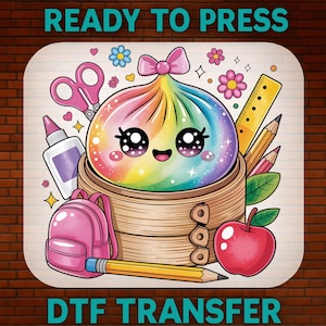 May include: A colorful rainbow-colored dumpling character with a pink bow sits in a bamboo steamer, surrounded by school supplies including pink scissors, a glue bottle, a yellow ruler, pencils, a pink backpack, and a red apple. Text reads READY TO PRESS DTF TRANSFER.