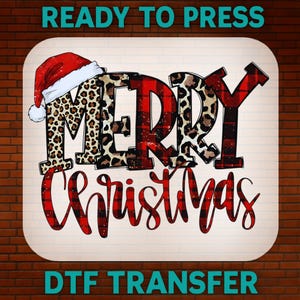 May include: A festive Christmas design with the words "MERRY CHRISTMAS" in a mix of leopard print and red plaid patterns. A Santa hat tops the letter "M". The words "READY TO PRESS" and "DTF TRANSFER" are also visible.