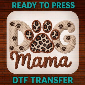 May include: A DTF transfer design featuring the words "DOG Mama" in a knitted style. The word "DOG" is formed by a paw print and two knitted letters with paw prints. The paw print and the letter "O" have a leopard print design. The words "READY TO PRESS" and "DTF TRANSFER" are at the top and bottom.