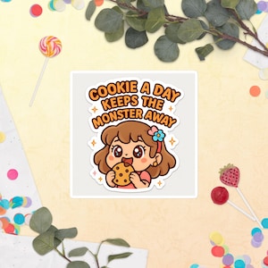 Kawaii Cookie Sticker – “Cookie a Day Keeps the Monster Away” – Cute Girl Eating Cookie Vinyl Decal for Laptops, Journals, and Gifts