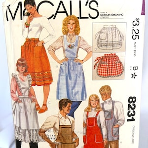 May include: Vintage McCall's sewing pattern envelope featuring illustrations of aprons. The cover showcases various apron styles, including a red and white checkered apron, a blue apron with floral embroidery, and a brown apron. The text "MCALL'S" is prominently displayed.