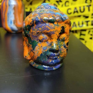 Chakra inspired art on Ceramic Buddha head figurine
