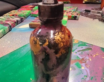 Astro inspired art on Repurposed glass tenture bottle