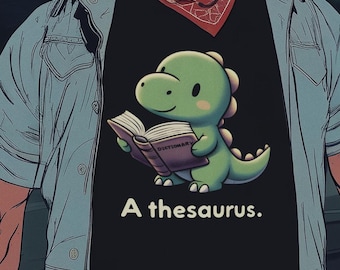 Dino Reading Tee - Niedliches Dinosaurier T-Shirt, lustiges Buch-Liebhaber Geschenk, Unisex Grafik-T-Shirt, perfekt für Geburtstage & Buchmessen