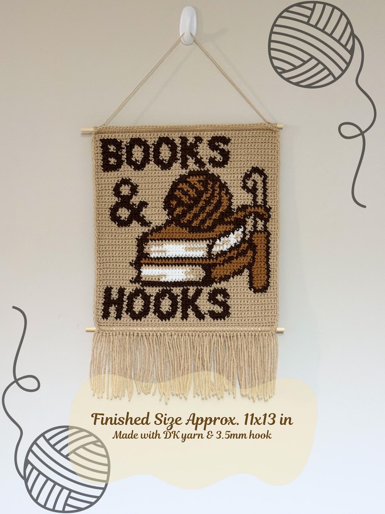 May include: Crocheted wall hanging with the words "BOOKS & HOOKS" in brown on a tan background. The design includes a yarn ball and a crochet hook. The finished size is approximately 28x33 cm.