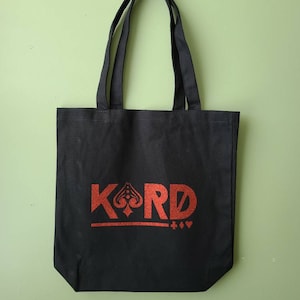 Bolsa tote de lona com logotipo Kard e personalização de viés opcional