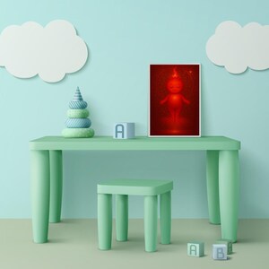 May include: A child's room scene with a mint green table and stool. A framed red artwork of a figure is on the table. A stackable toy and letter blocks are also on the table. White cloud-shaped wall decorations are above the table.