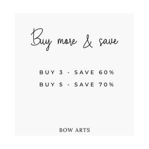 May include: White background with black text that reads "Buy more & save." Below, it states "BUY 3 - SAVE 60%" and "BUY 5 - SAVE 70%." The text "BOW ARTS" is at the bottom.
