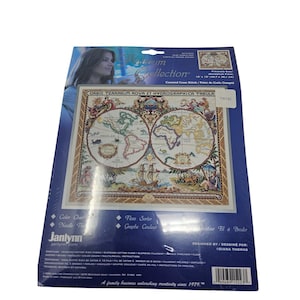 May include: A counted cross-stitch kit featuring a detailed world map design, titled "Orbis Terrarum Nova et Hydrographica Tabula." The kit includes a color chart, floss sorter, and needle threader. The finished size is 18 x 18 inches (45.7 x 45.7 cm).