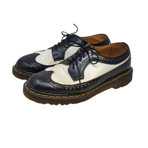 Black and white wingtip doc martens cheap