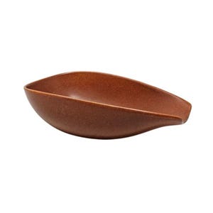 May include: A small, leaf-shaped ceramic dish with a textured, matte finish in a deep, earthy terracotta brown color. The bowl features a smooth, curved interior and a tapered, spout-like edge on one side, creating a simple, functional form.