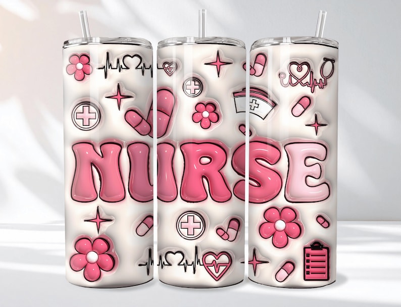 May include: A white tumbler with a pink and white design. The word "NURSE" is in large pink bubble letters. The tumbler is decorated with pink flowers, pills, crosses, stars, and a heartbeat symbol.