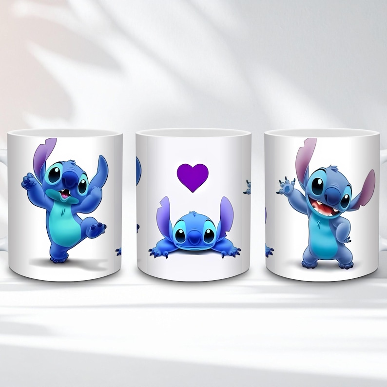 May include: White ceramic mug featuring the blue alien Stitch from Lilo & Stitch. The mug has three different designs: Stitch dancing, Stitch with a purple heart, and Stitch waving. The mug is a standard size for hot beverages.
