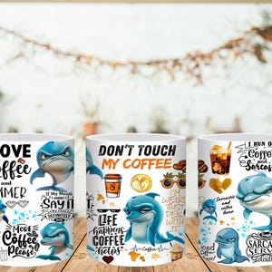 May include: Three white ceramic coffee mugs with various designs. One mug says "I LOVE Coffee and SUMMER" with dolphin graphics. Another says "DON'T TOUCH MY COFFEE". The third mug says "I RUN ON Coffee and Sarcasm".