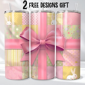 May include: Three stainless steel tumblers with Easter-themed designs. The tumblers feature a patchwork pattern with pink ribbons and bows, and include images of bunnies and the text "2 FREE DESIGNS GIFT".
