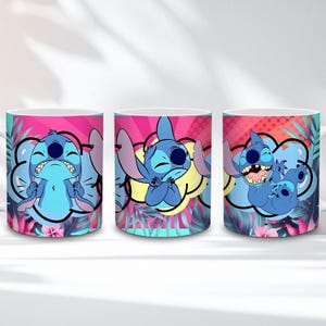 May include: Three white ceramic mugs featuring the character Stitch from Lilo & Stitch. Each mug displays a different pose of Stitch against a colorful background of pink, orange, and teal. The mugs are decorated with tropical leaves and flowers.