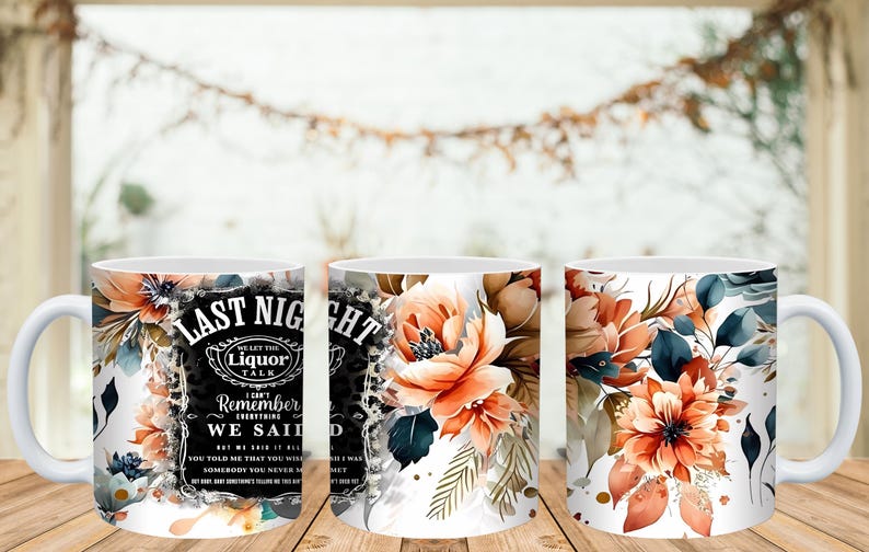 May include: White ceramic coffee mugs with floral designs and text. One mug features the words "LAST NIGHT" and "WE SAID" with a liquor-themed design. The other mugs have watercolor-style orange and blue floral patterns.
